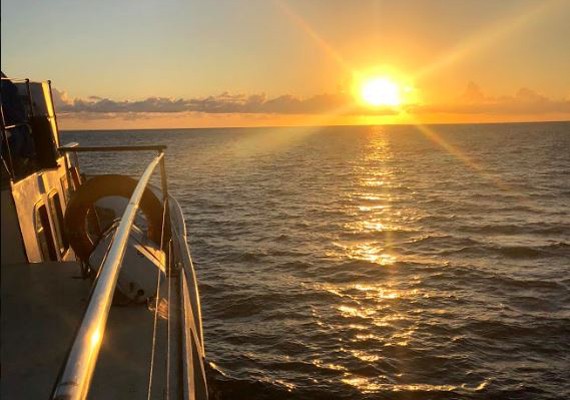 Sunset in catamaran
